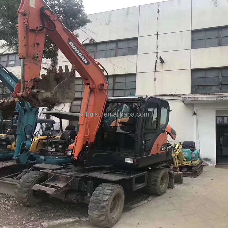 Doosan 60W ব্যবহৃত চাকার excavator জন্য চমৎকার কর্মক্ষমতা দ্বিতীয় হাত চাকার excavator Doosan DX60W