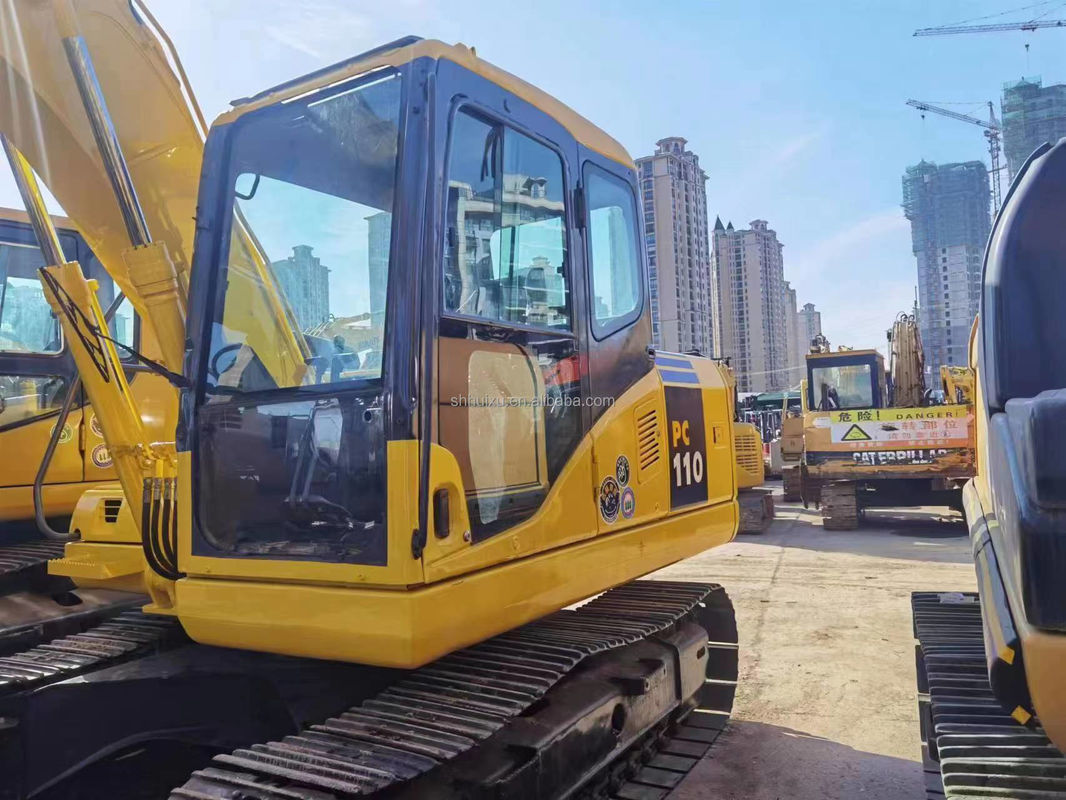 হস্ত ব্যবহৃত জমিন খননকারী Komatsu PC110 ব্যবহৃত যন্ত্রপাতি হস্ত ব্যবহৃত পোস্ট গর্ত খননকারী বিক্রয়ের জন্য দ্বিতীয় হাত খননকারী