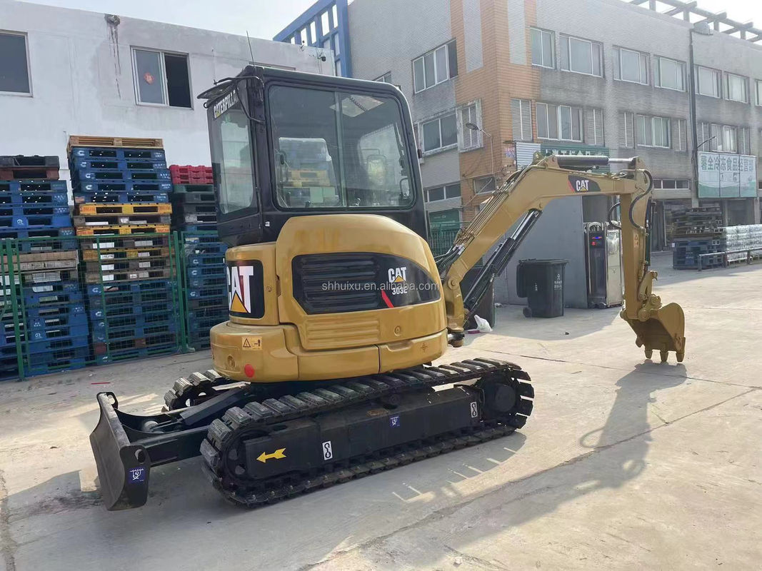 হলুদ রঙের মিনি ব্যবহৃত খননকারী Cat303e বিক্রির জন্য